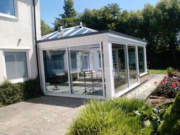 Mr & Mrs W. Caldy wirral : Design and construct orangery. Large dual sliding Allstyle Patio doors double glazed with self cleaning units Orangery with aluminium slidding doors wirral Hoylake near west kirby CH48