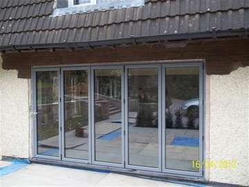 Mrs L. : CALDY WIRRAL : Installation of steel work and removal of brickwork to form opening. S1000 Bi Fold doors. Marine Finish Poyester coated finish Ral 7031 Example of aluminium triple glazed bi-fold doors. Aluminium bi-fold doors near Macclesfield SK11. Alumnus doors with 44mm triple glazing near Alderly Edge SK9. Aluminium Bi-fold doors near Wirral CH48 CH60. Alumnus Bi-fold doors triple glazed Liverpool Formby L37 near South Port PR8 Bi-fold doors near Crosby L23