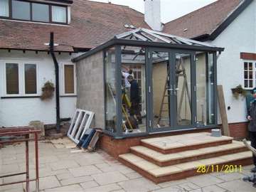 Mr & Mrs D. Bebington Wirral : Design and Build Allstyle Aluminium Conservatory. French doors double glazed - Roof Celsius One self clean Example of aluminium triple glazed bi-fold doors. Aluminium bi-fold doors near Macclesfield SK11. Alumnus doors with 44mm triple glazing near Alderly Edge SK9. Aluminium Bi-fold doors near Wirral CH48 CH60. Alumnus Bi-fold doors triple glazed Liverpool Formby L37 near South Port PR8 Bi-fold doors near Crosby L23