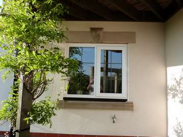 Mr & Mrs K. Caldy Wirral, : Installation of 2800 Triple glazed window. Glazed with 36mm units U value .85. 
