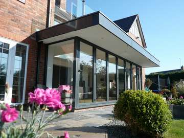 Caldy Wirral : Design and build - 4000 series Bi fold doors - sarnafil roof cover. Aluminium Fascias Aluminium Centor C1 Bi fold doors - Aluminium Slimfold Bi fold doors - Aluminium Triple glazed bi fold doors - Aluminium Bi fold doors with walk on flat doors Wirral - Aluminium Bi fold with balcony over had doors Heswall CH60 - Aluminium Bi fold doors Cheshire - Aluminium Bi fold doors with adjoining aluminium side window Chester CH1 - Aluminium Bi fold doors Liverpool - Aluminium Bi fold doors Formby L37 Aluminium Bi fold doors Crosby L23 - Our Aluminium Bi fold range is polyester powder coated. They can come with either 28 mm argon filed double glazing or 44mm argon filed triple glazing. Our range of Aluminium Bi-fold doors are Centor C1, Schuco, allstyle, Upvc, and wood Bifolds. Our Aluminium Bifolds can be found on the Wirral in areas such a Caldy CH48, Aluminium Bifold doors can also be found in West Kirby CH48. Due to an explosion in property in Liverpool there are ma