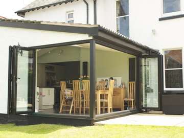 HESWALL WIRRAL : Installation of Smart 4000 Aluminium Bi Fold doors - Double glazed - Matt finish Ral 9017 Aluminium Folding sliding doors Wirral double glazed Example of aluminium triple glazed bi-fold doors. Aluminium bi-fold doors near Macclesfield SK11. Alumnus doors with 44mm triple glazing near Alderly Edge SK9. Aluminium Bi-fold doors near Wirral CH48 CH60. Alumnus Bi-fold doors triple glazed Liverpool Formby L37 near South Port PR8 Bi-fold doors near Crosby L23