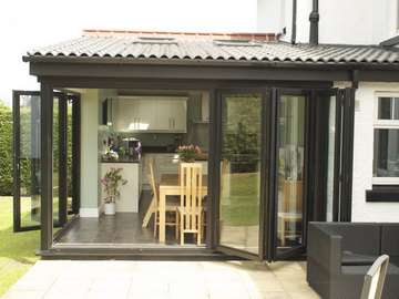 HESWALL WIRRAL : Installation of Smart 4000 Aluminium Bi Fold doors - Double glazed - Matt finish Ral 9017 Example of aluminium triple glazed bi-fold doors. Aluminium bi-fold doors near Macclesfield SK11. Alumnus doors with 44mm triple glazing near Alderly Edge SK9. Aluminium Bi-fold doors near Wirral CH48 CH60. Alumnus Bi-fold doors triple glazed Liverpool Formby L37 near South Port PR8 Bi-fold doors near Crosby L23