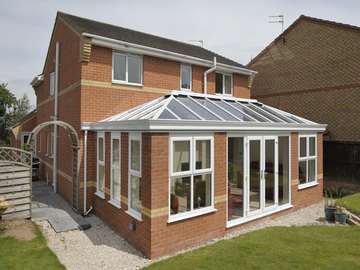 Warrington : Mr & Mr N : Design and build Orangery . roof K2 with Celsius one glass. Roof covering Sarnafil . 2800 Deceuninck window and doors triple glazed 