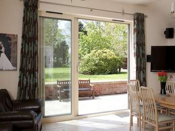 alpas Cheshire West : Installation of a 3 door - two sliding Allstyle Sliding Patio door in the open position