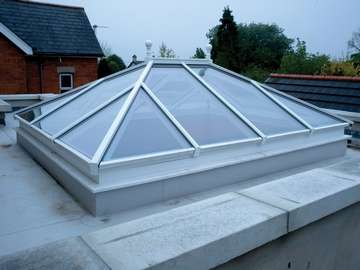 Mr F. Crosby, Liverpool : Installtion of a ATS slim line Alumnium Roof Lantern. 45mm wide spars - double or triple glazed. Thermally broken Alumnium. Marine Finish Polester pwder coated to any RAL Colour