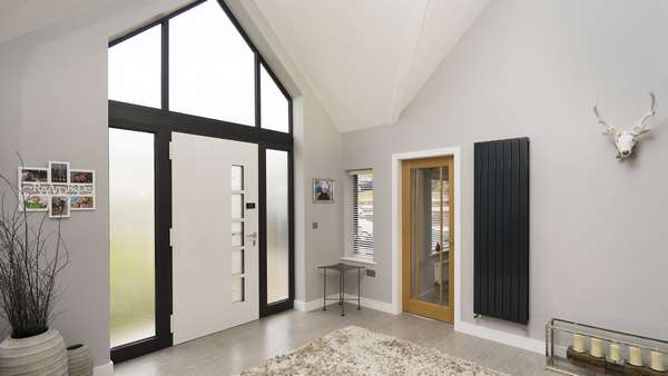 Internal view of this stunning entrance with pitchen window going right up into the pitched roof.