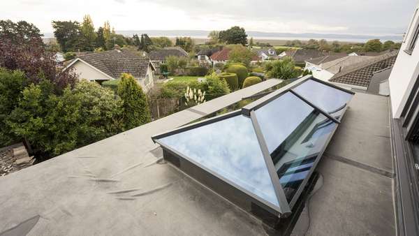 Close up of the aluminium roof lantern with blue tinted glass for added sun protection.