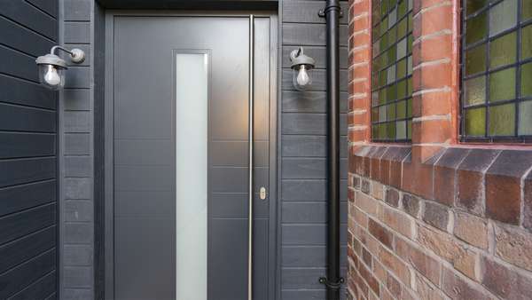 Straight on view of a Spitfire aluminium entrance door installed as part of this church conversion.
