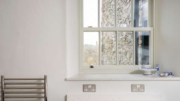 Internal shot of our aluminium clad timber sliding sash windows.