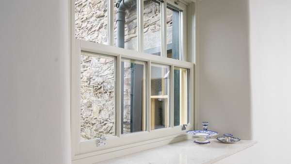 Close up of the glazing bars and window hardware on our Kight COllection sliding sash windows.