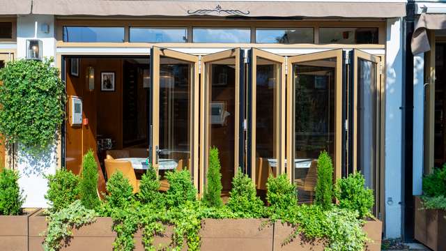 Open view of the Solarlux bifolding doors.