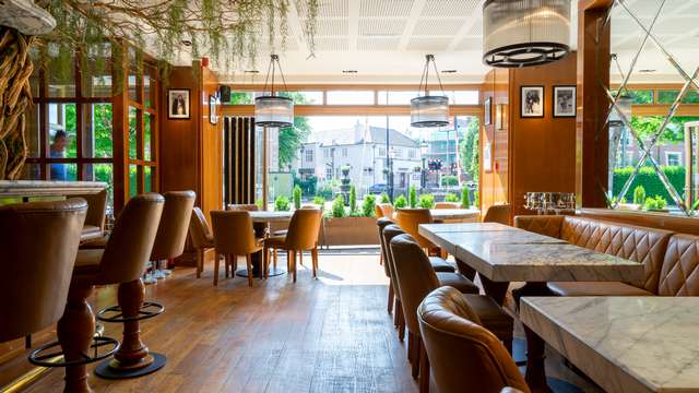 Overview of the CIBO restaurant internally with the bifolding doors open.