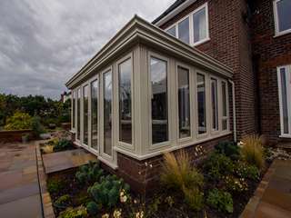 Close up of Evolution windows installed with feature corner posts.