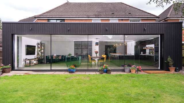 External views of large aluminium sliding doors.