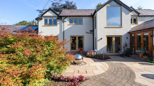 Straight on view of the Oak flush UPVC windows in Cheshire.