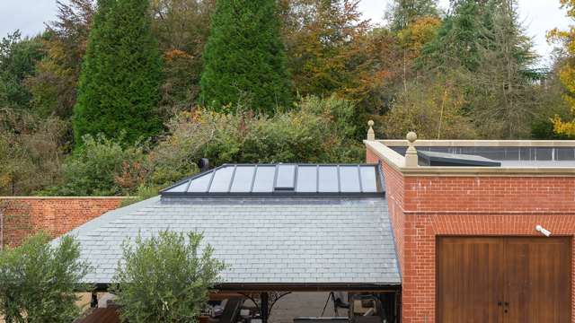 Straight on view of the aluminium roof lantern from the main building.