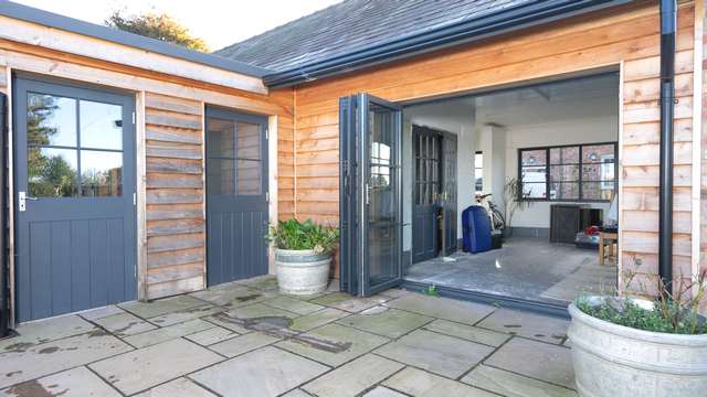 Fully open view of the bifold doors in Cheshire.