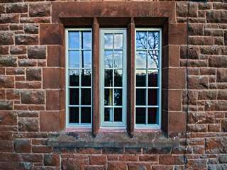 Period cottage installation of three timber alternative windows.
