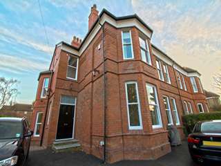 Front and side aspect, showing full installation of sliding sash windows.