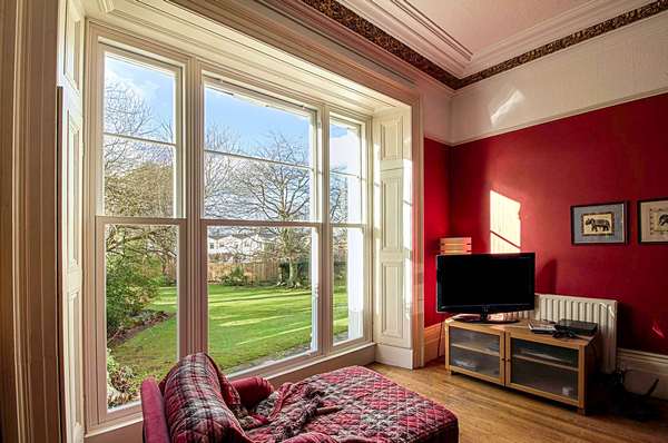 Internal images of triple sash window installation almost impossible to tell that these are not original timber sash windows, however having the benefits of modern double glazing and low maintenace UPVC.