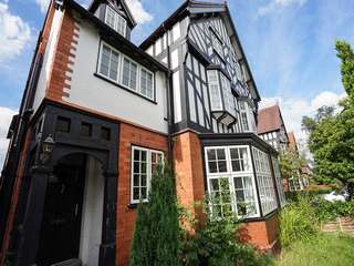 Alternative view showing brand new front door and windows, the door is a UPVC timber alternative door from The English Door Company and the windows are from Evolution.