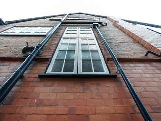 Large stormproof obscure glazed casement window to the side of the property.