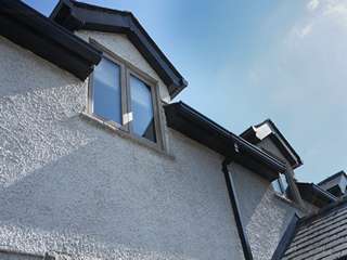 Detail shot showing dormer windows.