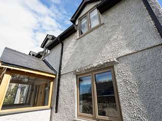 Close up of the front of this new build showing Residence 9 windows with triple glazing.