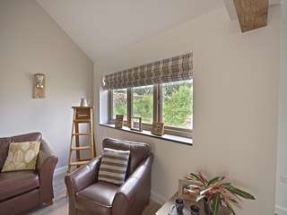 Internal shot showing triple sash Residence 9 windows with internal woodgrain finish and authentic cast iron effect handles.