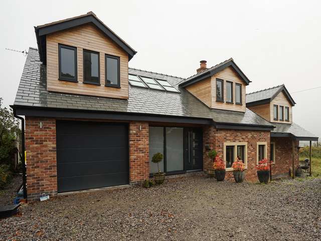 Aluminium windows and door installation throughout this new build in Lymm, Cheshire.