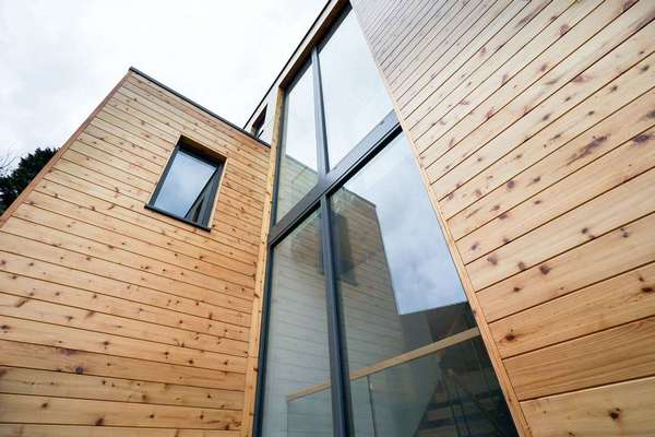 Close up of curtain walling at the left elevation of the property.
