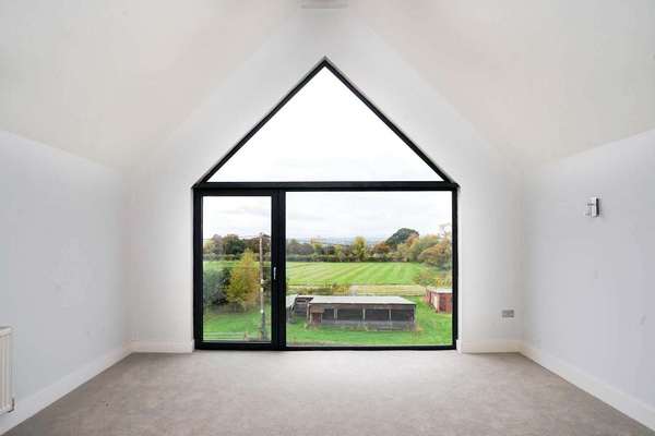 Feature main bedroom window with pitchen top light.
