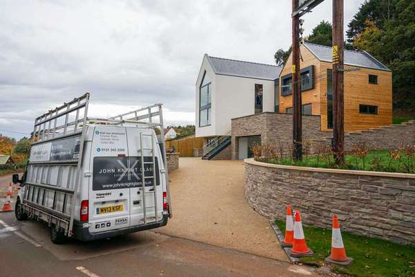 One of our installation teams putting the finishing touches on this full house aluminium window installation in Kelsall near Delemere Forest.
