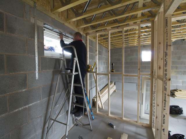 Mike and Carl working hard on the project to install  the Rationel windows,.