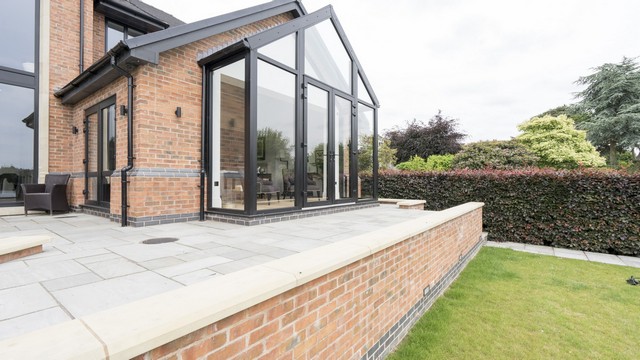 Large glass aluminium pitched space, the perfect place to read a book.