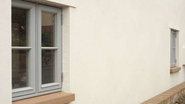 Close up of the downstairs window details to the front of the building.