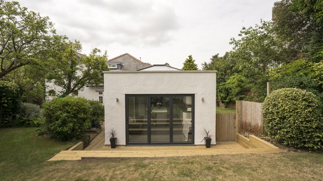 Straight on view of the Orangery with aluminium bifolds and roof light.