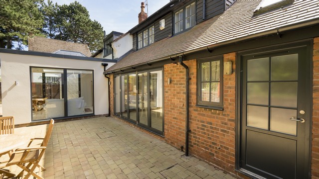 Full house replacement of windows and doors including a new modern style extension adding contrast to the rest of the propertry.